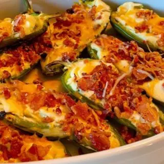 Bacon Stuffed Jalapeno Poppers in baking dish.