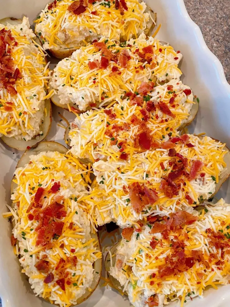 Stuffed baked potatoes ready for the oven.