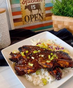 Hawaiian-Style Grilled Short Ribs on a plate with white steamed rice.