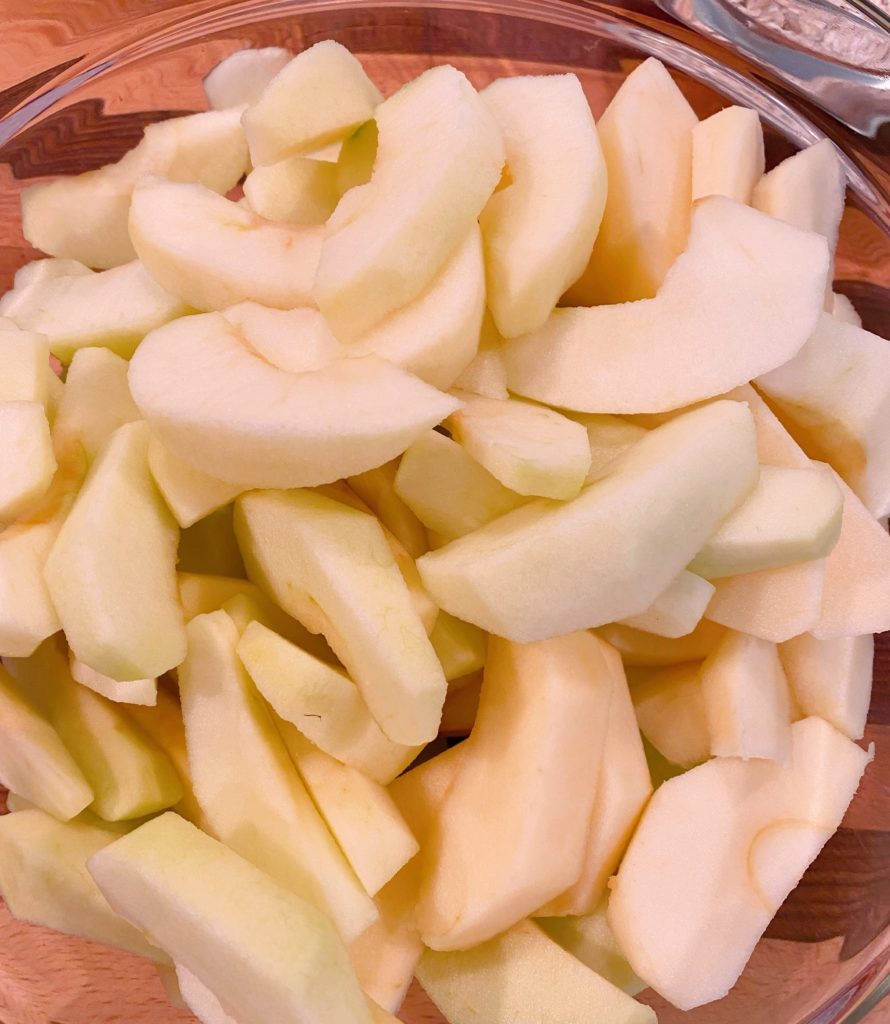 Sliced Apples in a large bowl.