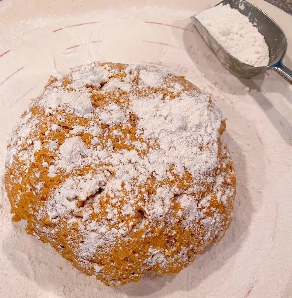 Pumpkin Spice dough on a floured surface ready to roll out.