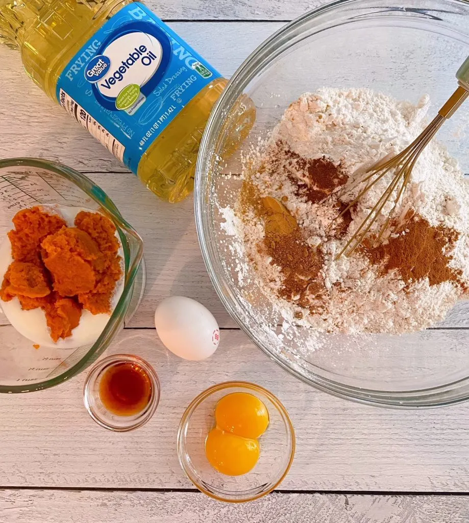 Ingredients for Pumpkin Spice Donuts laid out on the table.