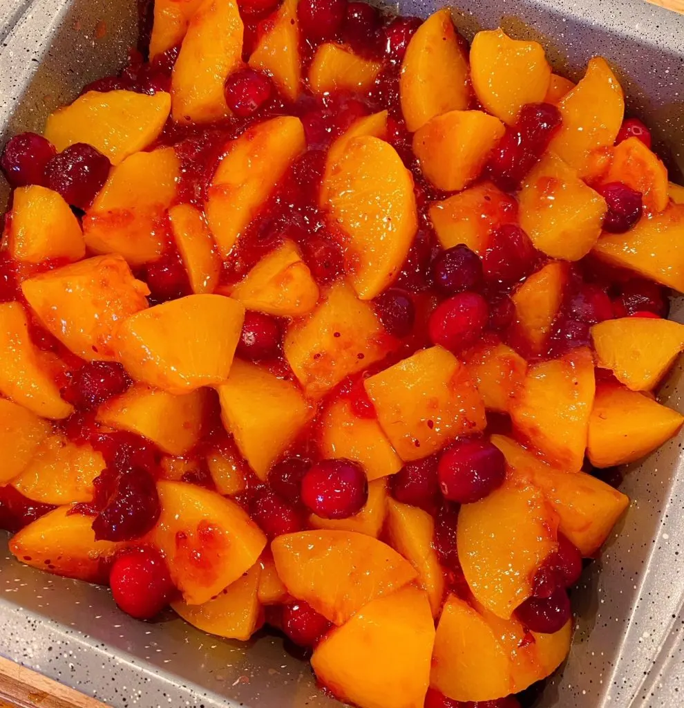 Peach and cranberry filling in an ungreased 9 x 9-inch baking dish.