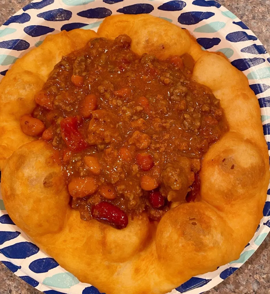 Meat Sauce in the center of a piece of Fry Bread.