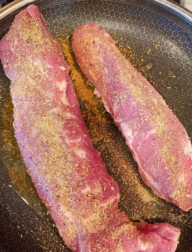 Braising Pork Tenderloin in large skillet.