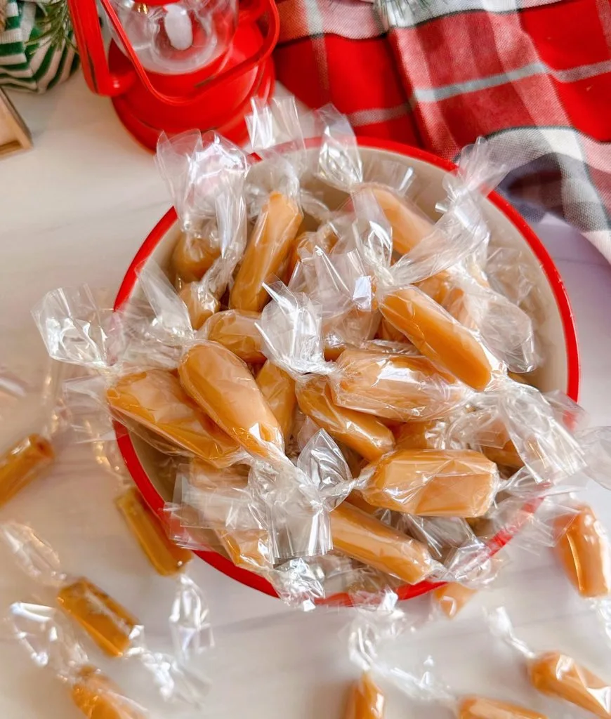 Homemade Caramels in a large candy bowl . 