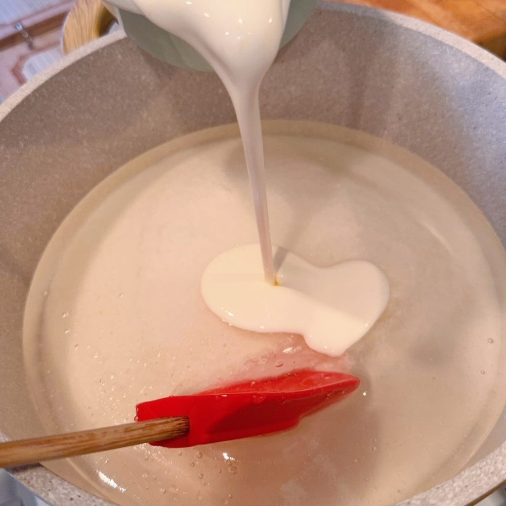 Large pot with sugar, light corn syrup, and heavy cream.