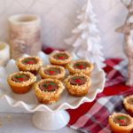 Peanut Butter Cup Christmas Cookies on a white platter.