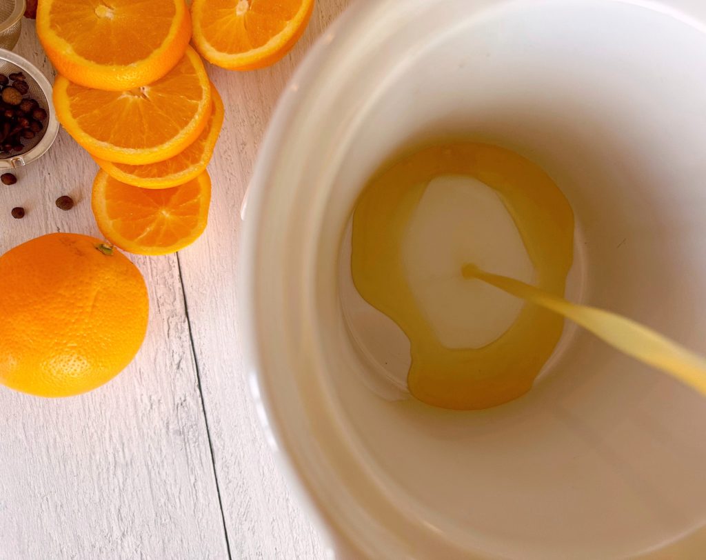 Adding Cider to Slow Cooker.