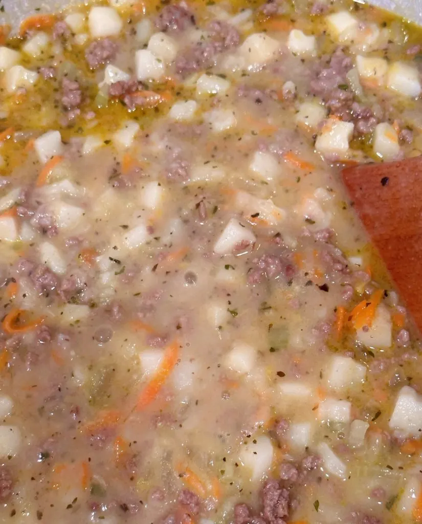 Soup thickening on stove top after addition of roux.