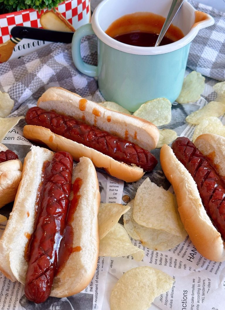 Copy Cat Air Fryer J. Dawgs on buns with chips and extra sauce.