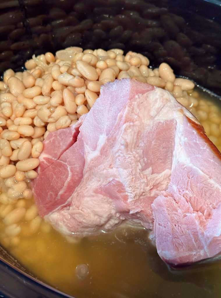 Crock pot with Ham bone and Navy Beans.