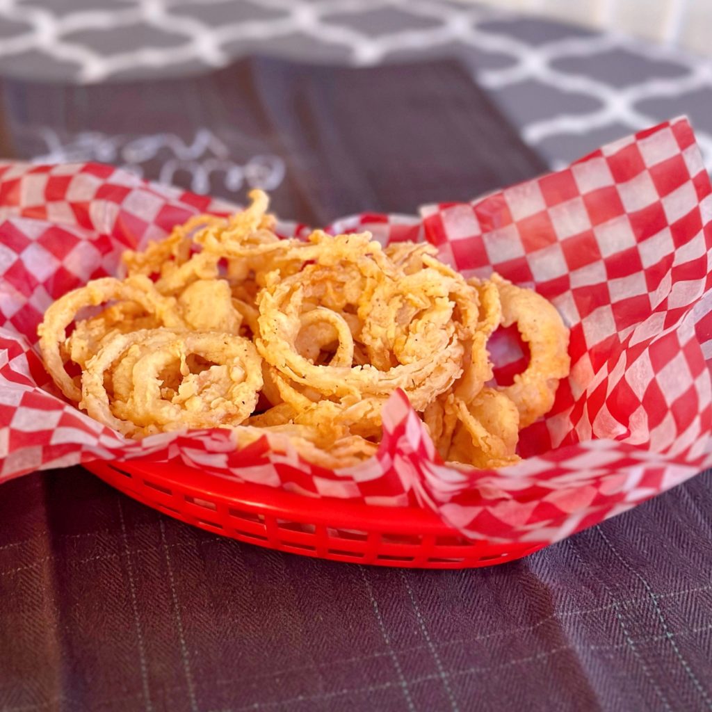 Basket full of onion straws.