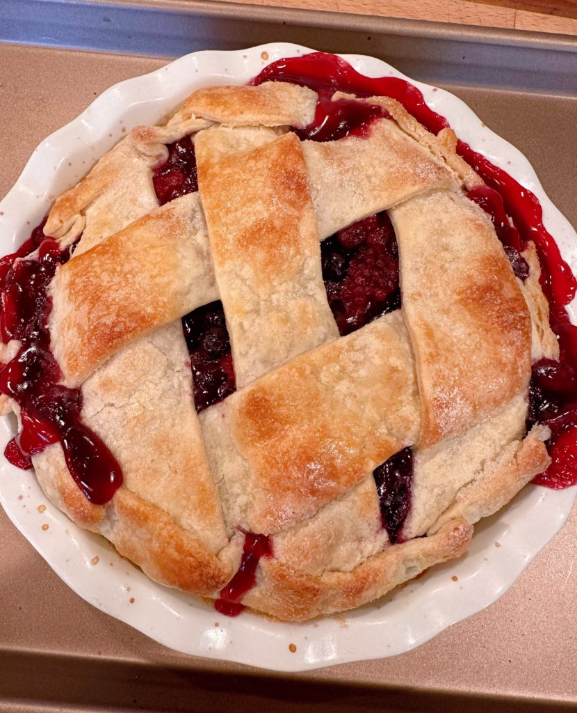 Pie Fresh out of the oven! Pie filling bubbled over edges of crust.