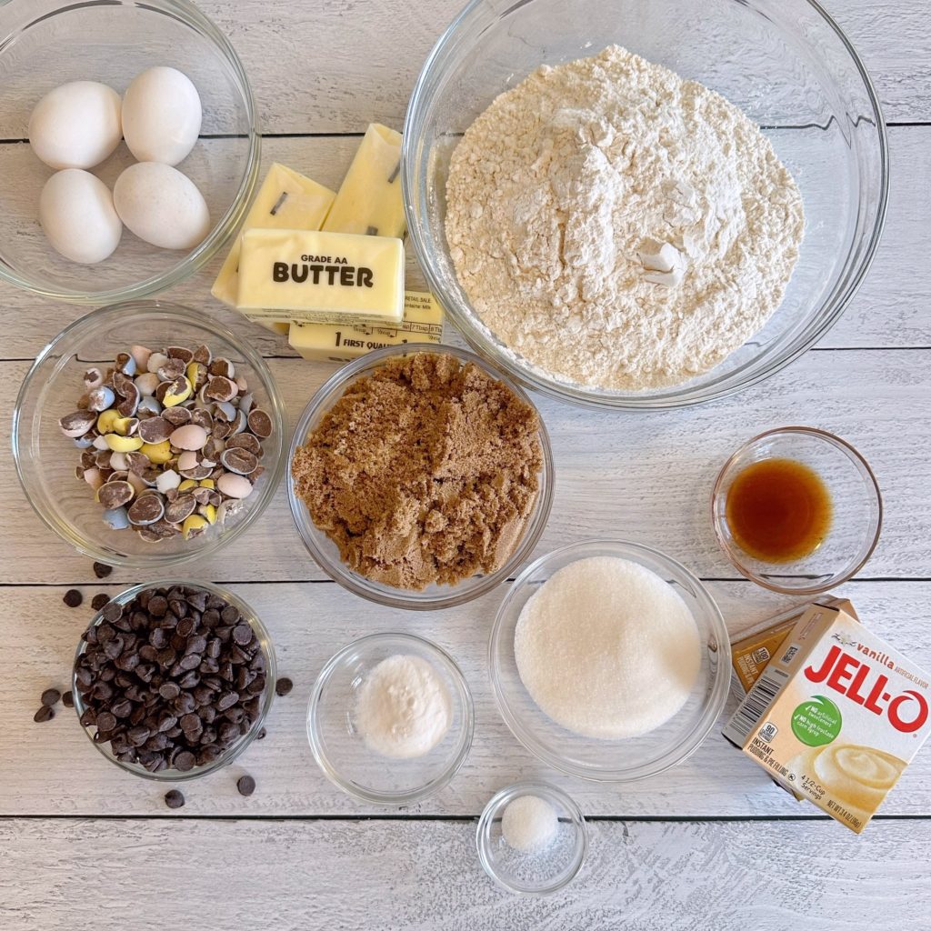 Ingredients for Cadbury Mini Chocolate Chip Cookies on a white board.
