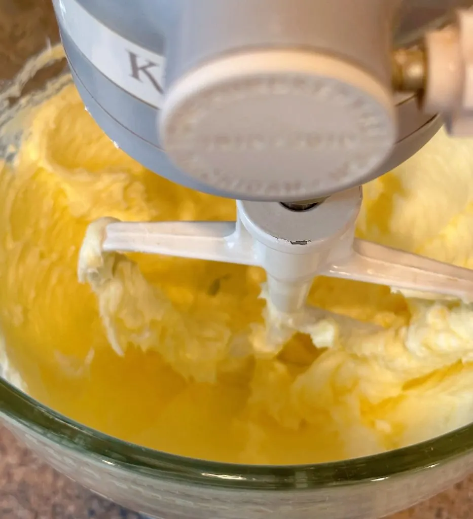 Butter and sugars creamed together in mixing bowl of mixer.