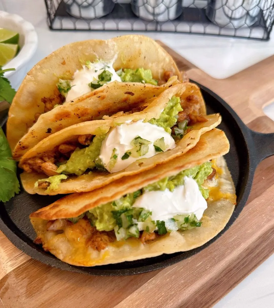 https://www.norinesnest.com/wp-content/uploads/2023/03/Chicken-Skillet-Tacos-2023-9-909x1024.jpg.webp