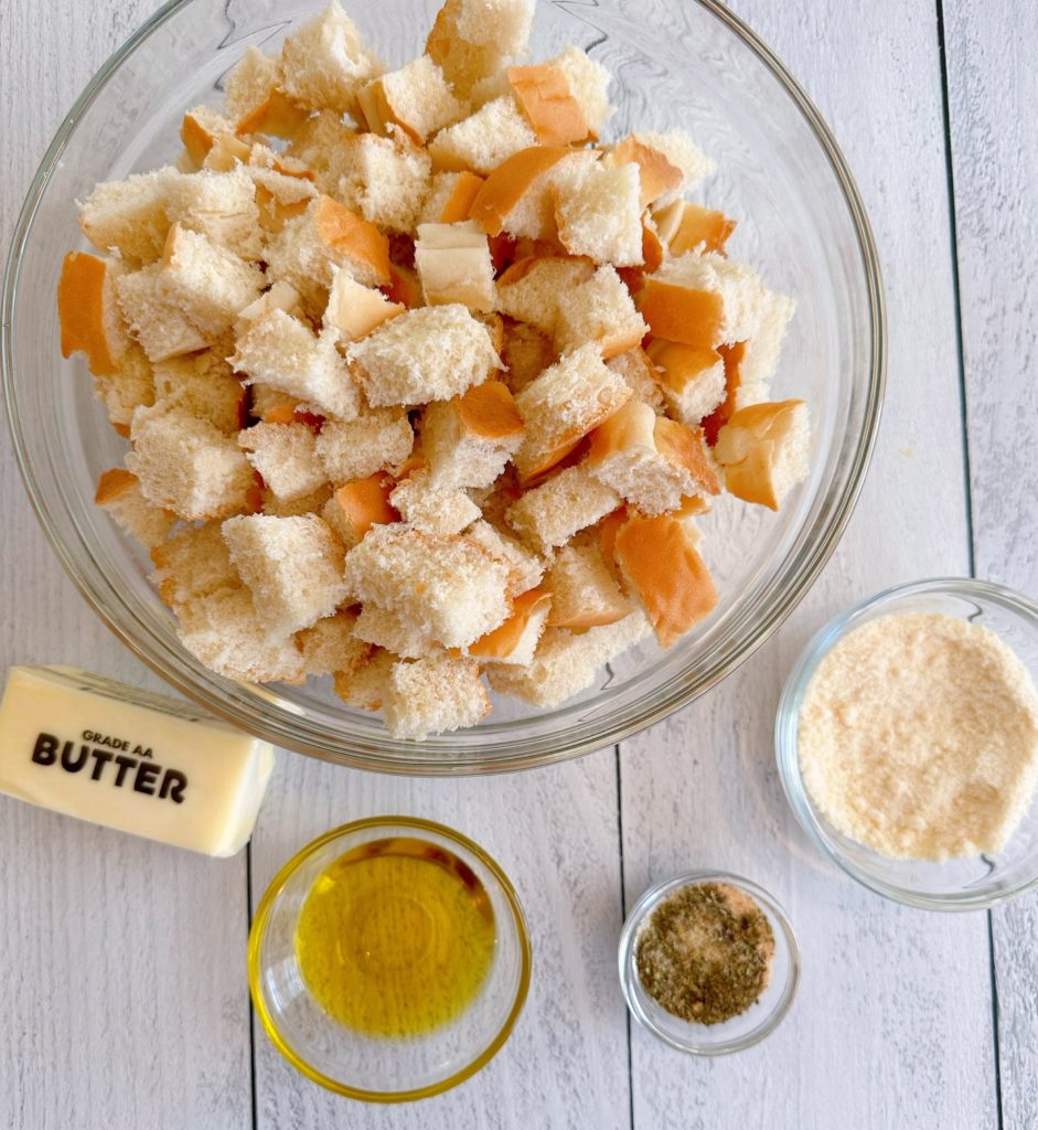 Ingredients for Homemade Croutons on a white board.