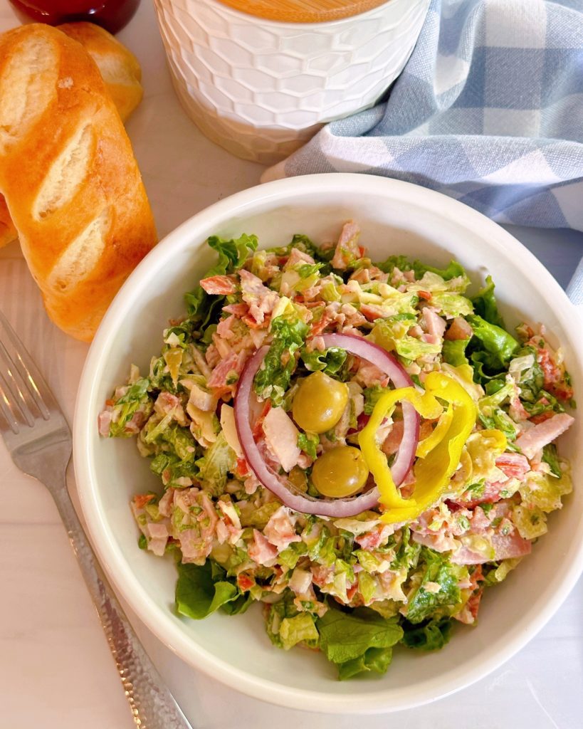 Italian Grinder Salad in a white bowl.