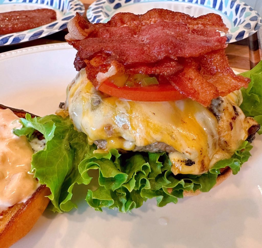 Burger being assembled.