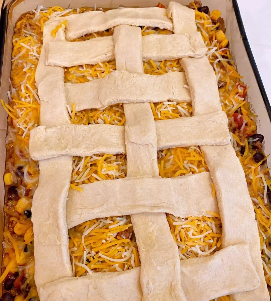 Creating the lattice top for Cornbread taco casserole.