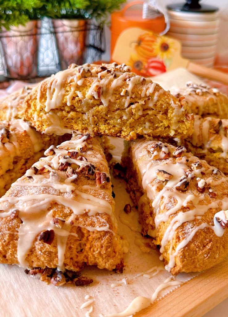 Oatmeal Pumpkin Scones piled high with Maple Glaze.