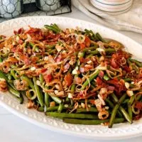 Balsamic Green Beans with Bacon on a white platter.