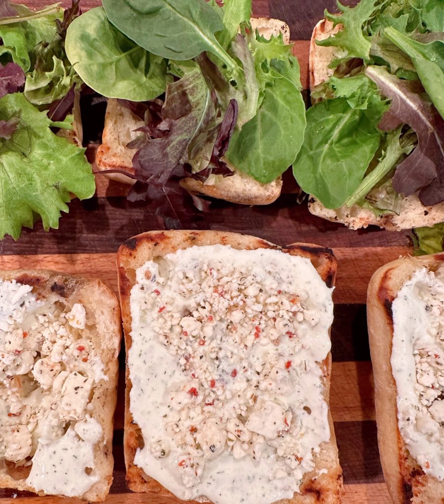 Ciabatta Rolls with Dill sauce and feta and spring mix. 