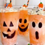 Fanta Jack O'lantern Halloween Floats with festive straws and sprinkles.