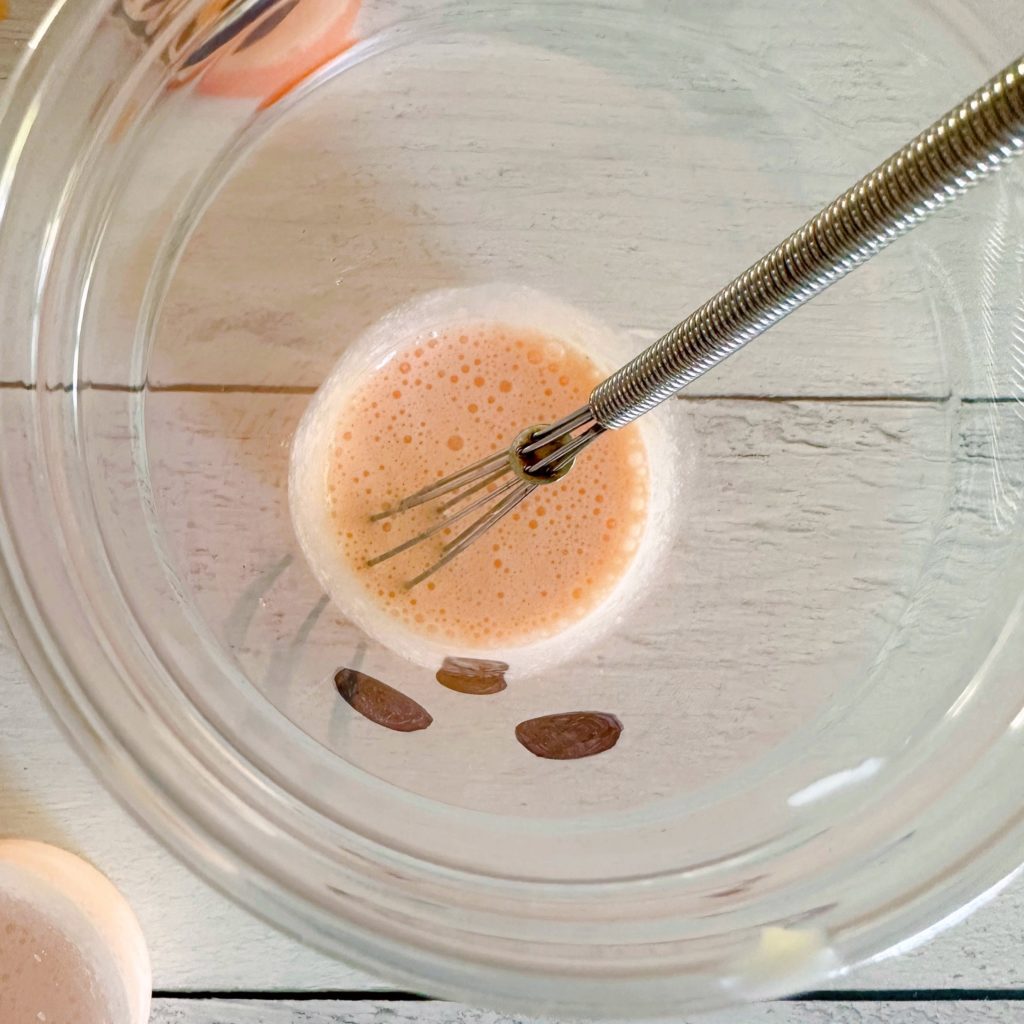 Frothy cream at the bottom of each cup.