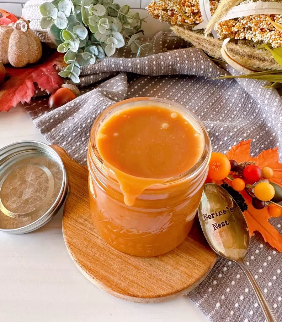 Overhead shot of caramel sauce in a mason jar.