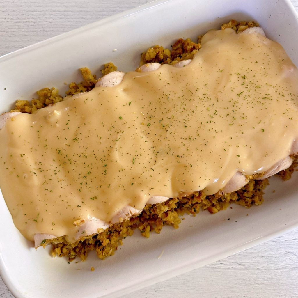 Turkey Rolls covered in gravy before baking.