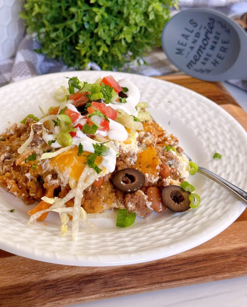 Walking Taco Casserole on a white serving plate.