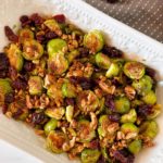Roasted Brussels Sprouts in a white serving dish.