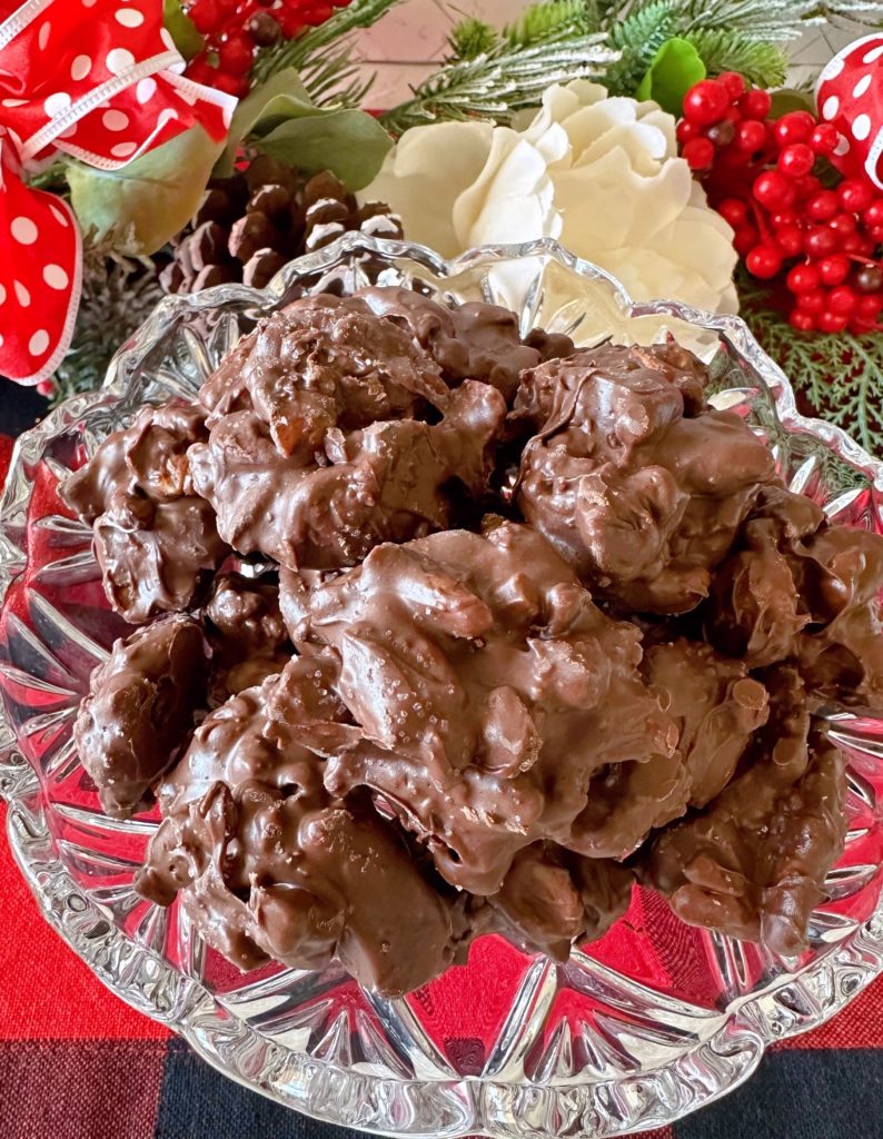 Crock pot turtle candy in a crystal candy dish.