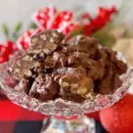 Crockpot Chocolate Turtles in a beautiful candy dish.