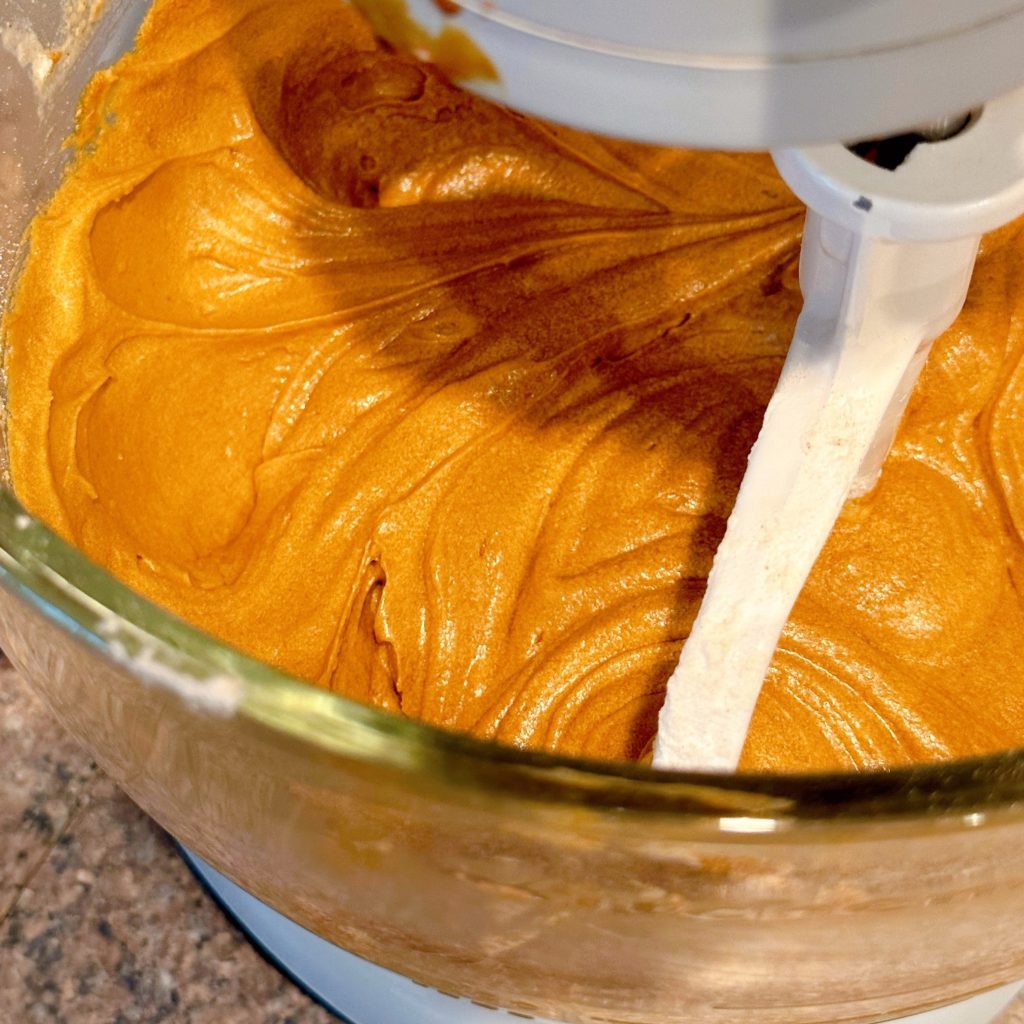 Gingerbread Cake batter in mixing bowl of mixer.