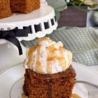 Gingerbread Cake with Caramel sauce on a dessert plate.