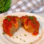 Individual Stuffed Italian Meatloaf cut in half with cheese oozing out!