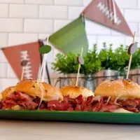 Hot Pastrami Sandwiches on a game day platter.