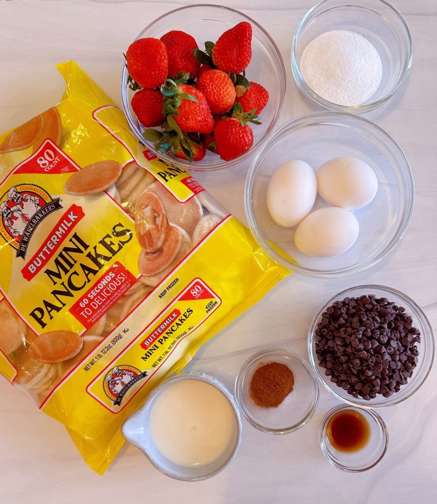 Ingredients on a white counter top for pancake french toast bake.