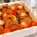 Baked Pancake French Toast Casserole with strawberries and chocolate chips.