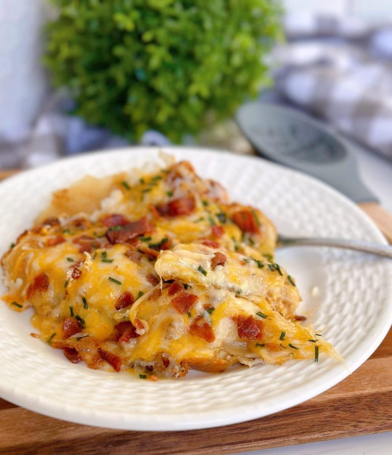 Easy Cheesy Sausage and Pierogi Casserole on a serving plate.
