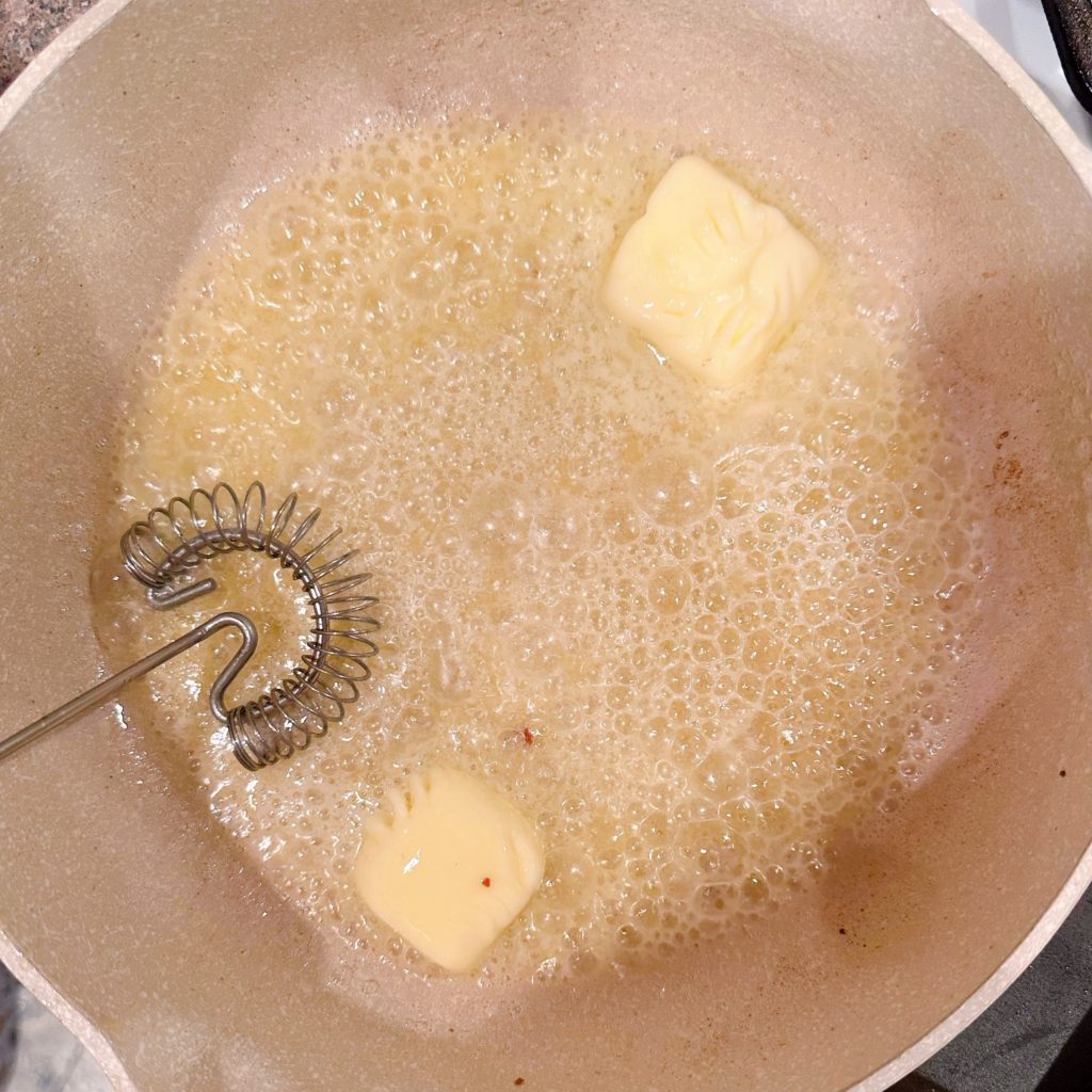 Melting butter in a medium skillet over medium heat.