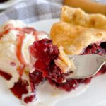 Forkful of blackberry pie.