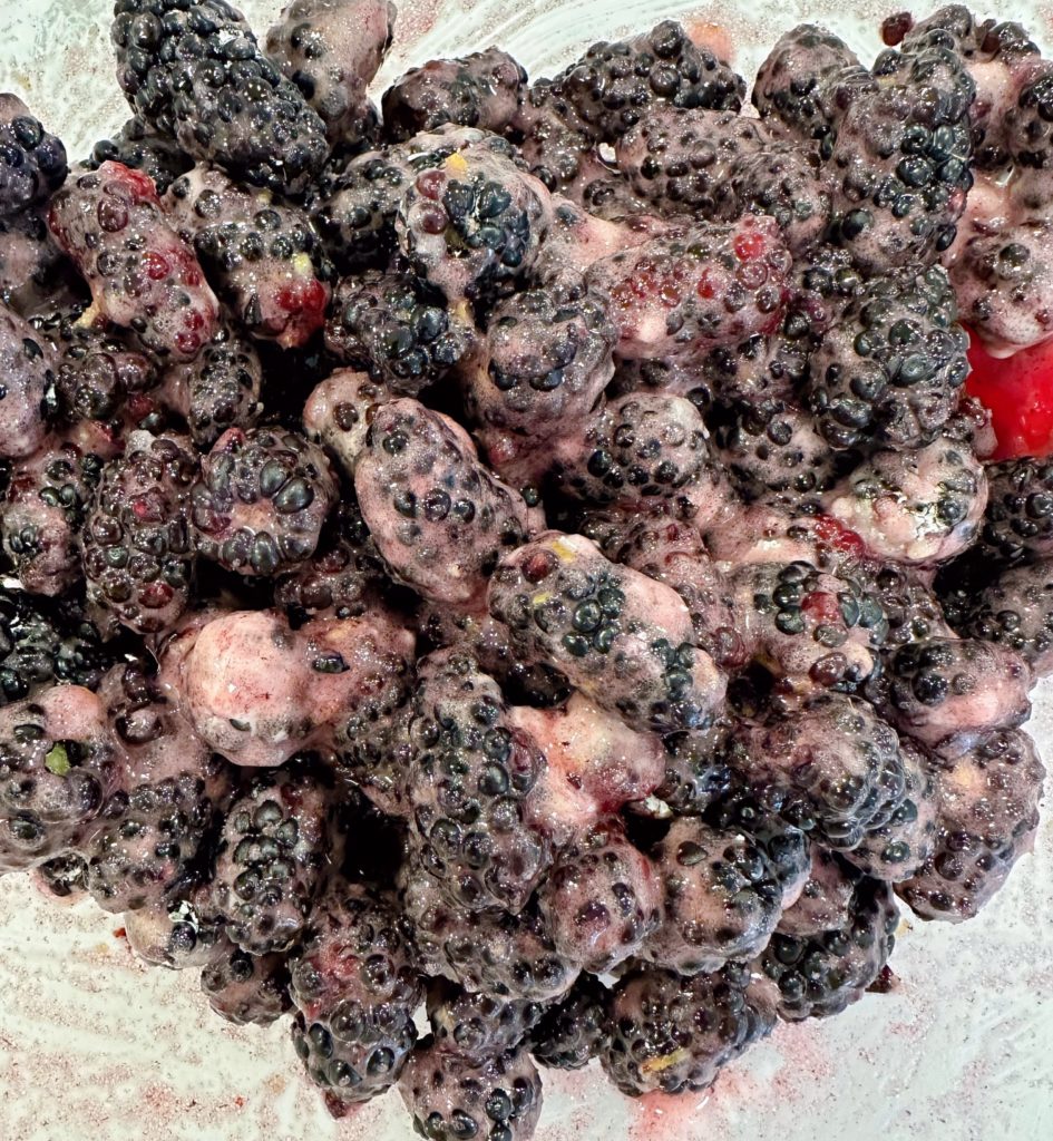 Berries mixed with sugar, cinnamon, and cornstarch.