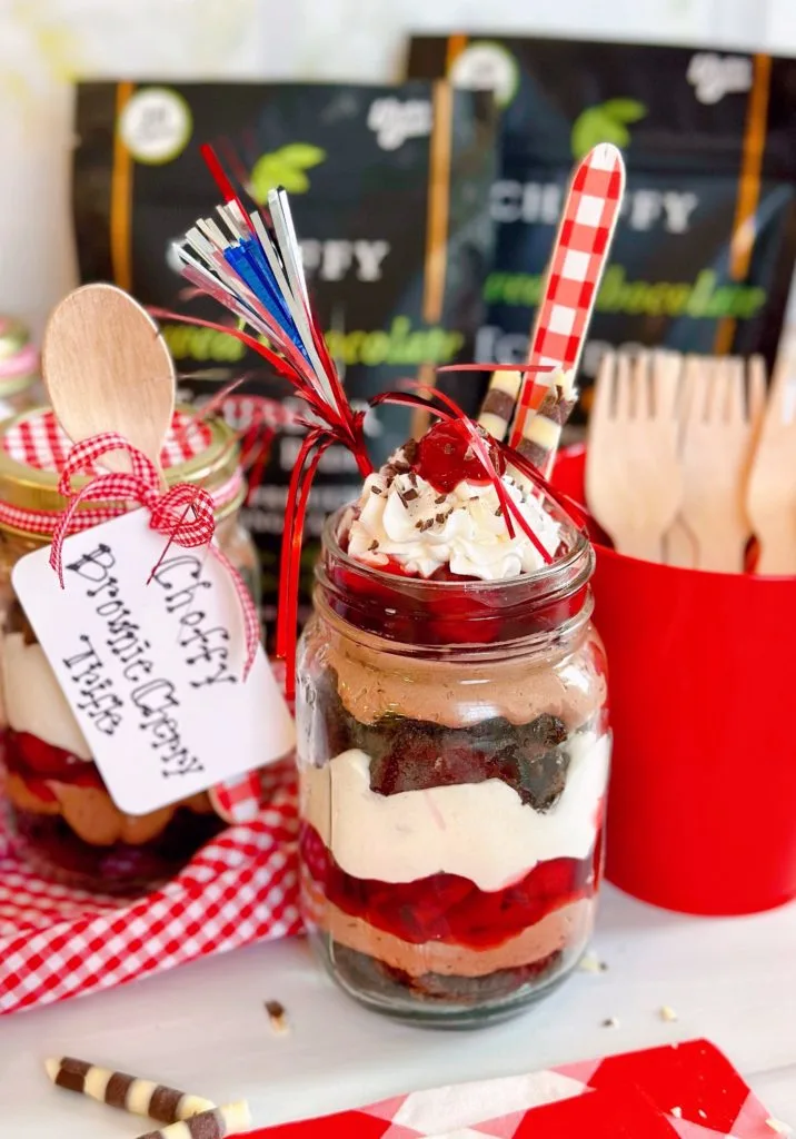 Choffy chocolate trifle in individual mason jars and holiday decorations.
