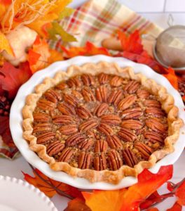 Pecan Pie with beautifully arranged pecans on top.