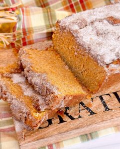 Sweet Potato Cinnamon Bread sliced on a cutting board ready to eat.