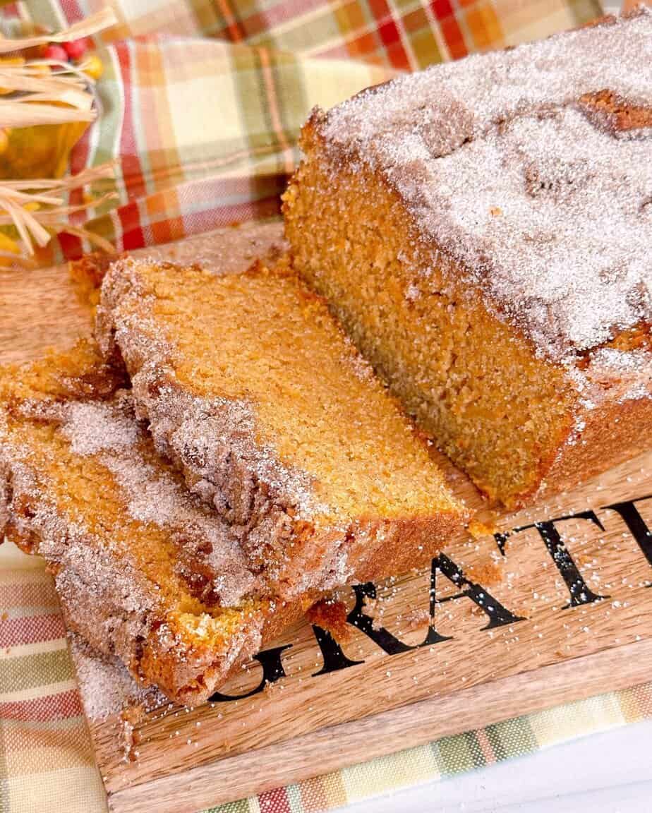 Sweet Potato Cinnamon Bread sliced on a cutting board ready to eat.